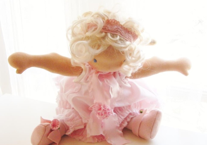 A Pink Ballerina doll by Louie Louie Bebe