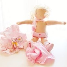 A pink ballerina Waldorf doll by Louie Louie Bebe